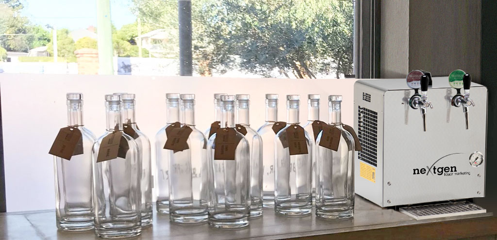 Wine dispensing system using returnable bottles